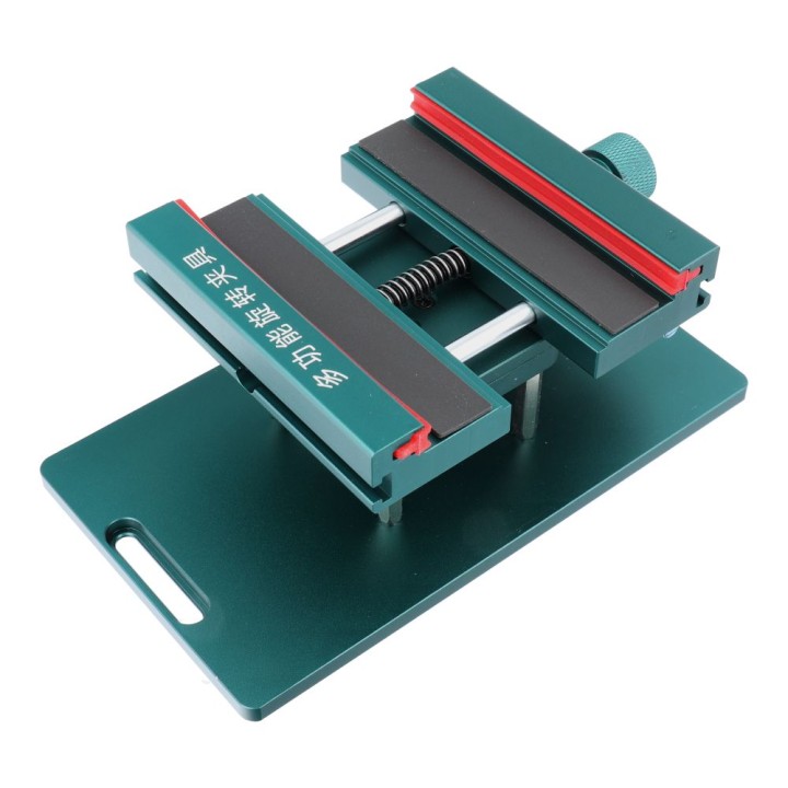 Rotating universal holder for housing repair